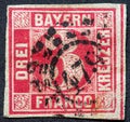 Bavaria / Germany circa 1862: A stamp from Bavaria in Germany in red showing the number three cruisers and the word Franco