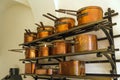 Bavaria, Germany - October 15, 2017: Bronze pots and plates inside Neuschwanstein Castle