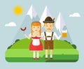 Bavarian couple with beer and sausages in mountain