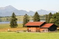 Bavarian farm by an alpin lake