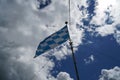 Bavarian flag flies against a blue white sky on a summer day in Bavaria Royalty Free Stock Photo