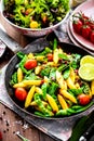 Bavarian fried finger-shaped potato dumplings with vegetable.