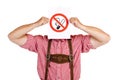 Bavarian man holds no-smoking-rule sign Royalty Free Stock Photo