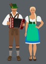 Bavarian man in lederhosen with accordion and girl in Dirndl