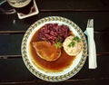 Bavarian Sauerbraten of beef, bread dumplings Royalty Free Stock Photo