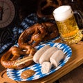 Bavarian sausage with pretzel, sweet mustard Royalty Free Stock Photo