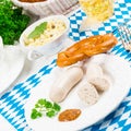 Bavarian sausage with pretzel, sweet mustard Royalty Free Stock Photo