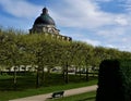 Bavarian State Chancellery behind trees of the court garden