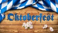 Bavarian tablecloth and the slogan `Oktoberfest 2018`