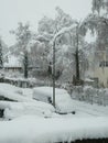 Bavarian urban street under heavy snowfall Royalty Free Stock Photo