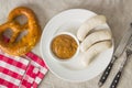 The bavarian weisswurst, pretzel and mustard. Royalty Free Stock Photo