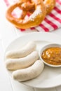 The bavarian weisswurst, pretzel and mustard. Royalty Free Stock Photo