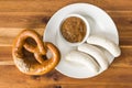 The bavarian weisswurst, pretzel and mustard. Royalty Free Stock Photo