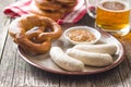 The bavarian weisswurst, pretzel and mustard. Royalty Free Stock Photo