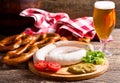 Bavarian white sausages with pretzel and glass of beer