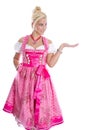 Bavarian woman - isolated in bavarian dress presenting and making promotion.