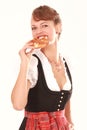 Bavarian woman with pretzel in his hand Royalty Free Stock Photo