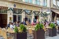 The Bavarians are resting at the tables of the beer restaurants, Munich, Germany