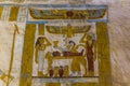 BAWITI, EGYPT - FEBRUARY 5, 2019: Wall painitngs of the embalming process in the Tomb of Bannentiu in Bahariya oasis