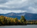 Baxter Peak view surrounded by moody clouds from Lake Katahdin, Maine, in early fall Royalty Free Stock Photo