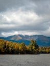 Baxter Peak view surrounded by moody clouds from Lake Katahdin, Maine, in early fall Royalty Free Stock Photo