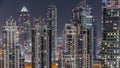 Bay Avenue with modern towers residential development in Business Bay aerial night timelapse, Dubai