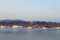 Bay and boats on the water. Low mountains in the distance. Resort on the Red sea coast, Egypt Royalty Free Stock Photo