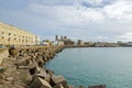 Bay of Cadiz with its waterfront promenade Avenida Campo del Sur and the Cadiz Cathedral