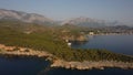 A bay Cennet Koyu with a Tahtal? Dagi mountain and Kemer view from a drone.