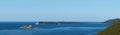 Bay Gertsegnovska in Adriatic Sea. Island Mamula or Lastavica with Fort. Calm sea and clear blue sky. Panorama Royalty Free Stock Photo