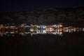 Bay of Kotor as Seen from Kotor Port with Reflection of City Lights Royalty Free Stock Photo