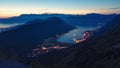 Bay of Kotor night panorama with historical Kotor old town, and the Boka-Kotorska bay rocky shores. Montenegro.