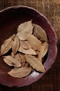Bay leaf, dried herb in a bowl