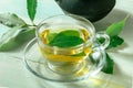 Bay leaf tea. Fresh laurel leaves infusion with a cup and a teapot