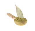 Bay leaf in a wooden spoon isolated on a white background Royalty Free Stock Photo