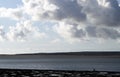 The bay near Caernarfon with a view over the water to the Welsh island of Anglesey.