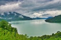 Bay surrounded by cloud-covered hills, Marlborough Sounds, New Zealand Royalty Free Stock Photo