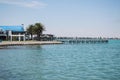 Bay with Turquoise Sea and a Pier in Walvisbay, Namibia Royalty Free Stock Photo