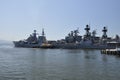 Bay view in Vladivostok, Russia. Warships and fishing ships, boats in marina, port