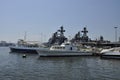 Bay view in Vladivostok, Russia. Warships and fishing ships, boats in marina, port