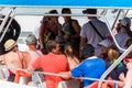 BAYAHIBE, DOMINICAN REPUBLIC - MAY 21, 2017: Tourists get into boat. Close-up.