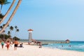 BAYAHIBE, DOMINICAN REPUBLIC - MAY 21, 2017: View of the lighthouse on the sandy beach. Copy space for text. Royalty Free Stock Photo