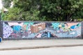 BAYAMO, CUBA - JAN 30, 2016: Colorful mural on a street in Bayamo depicting local means of transpor