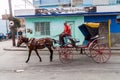 BAYAMO, CUBA - JAN 30, 2016: Horse carriages are very common mean of transport in Bayamo, Cub