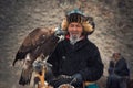 Bayan-Olgii, Mongolia - October 01, 2017: Golden Eagle Festifal. Portrait Of Picturesque Old Greybearded Mongolian Hunter Berkutch