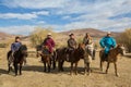 Kazakh Berkutchi Eagle hunters on horseback. In Bayan-Olgii Province is populated to 88,7% by Kazakhs.