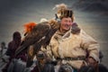 Bayan-Olgiy aimag, Western Mongolia - October 07,2018: Nomad Games, Altai Eagle Festival.Hunter With Silver Teeth Celebrating Vict Royalty Free Stock Photo