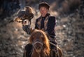 Bayan-Olgiy Aimag, Western Mongolia - October 07,2018: Nomad Games, Altai Eagle Festival. Old Equestrian In National Costume On A