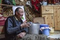 Mongolian nomad man drinking tea