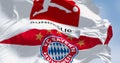 Bayern Munich flag waving with Bundesliga flag on a clear day
